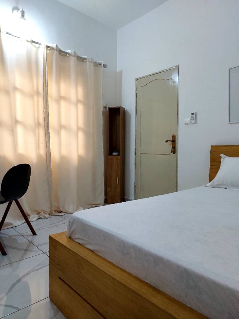 Chambre avec linge de maison